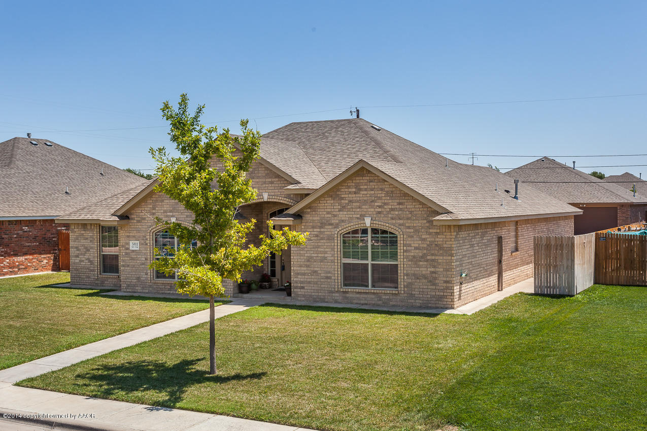 5811 South Rusk Street Amarillo, TX 79118 - Photo 22 of 22 a front view of a house with garden