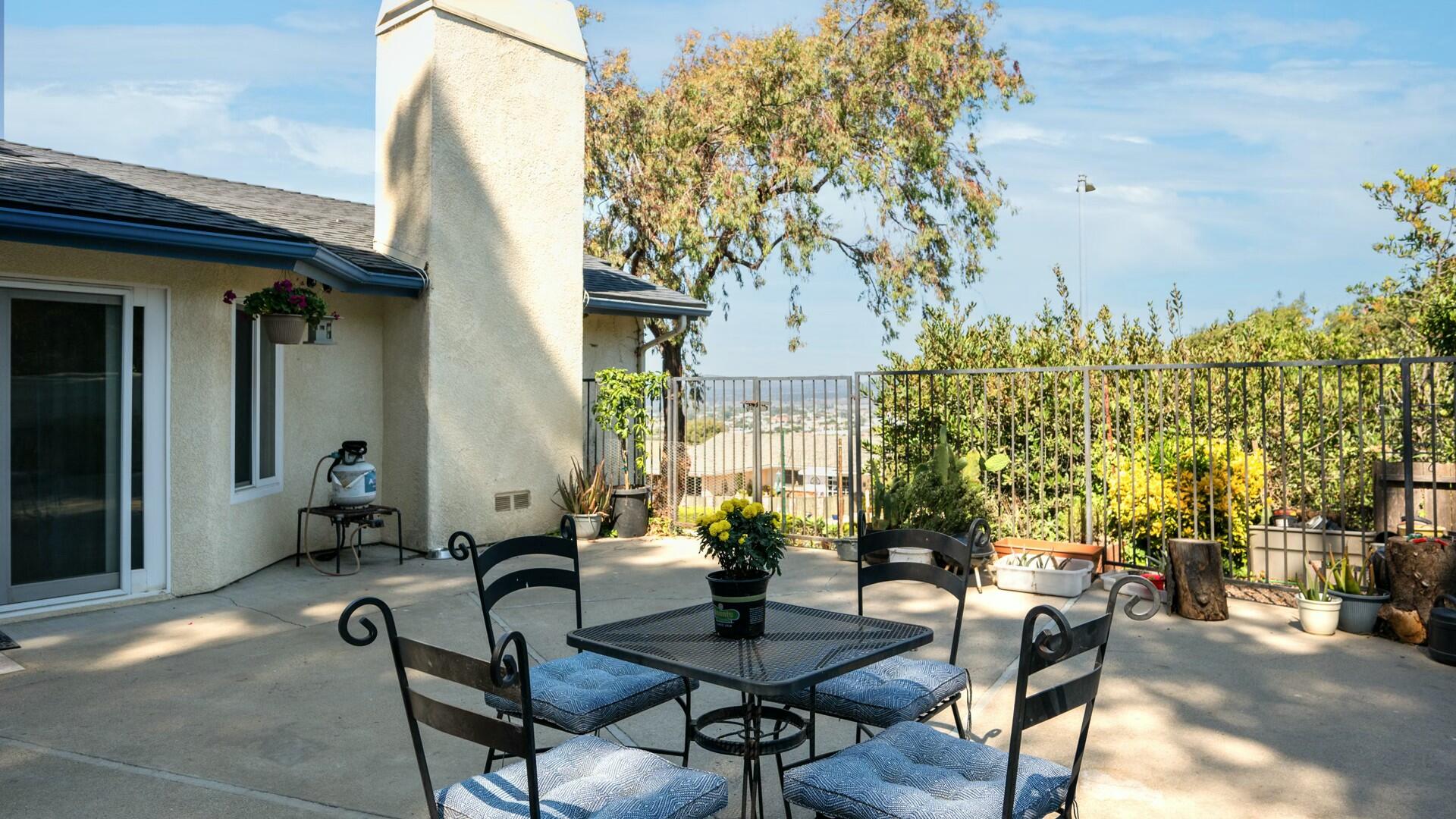 34 Cambridge Drive Lompoc, CA 93436 - Photo 21 of 26 a view of a dining room with furniture and chandelier