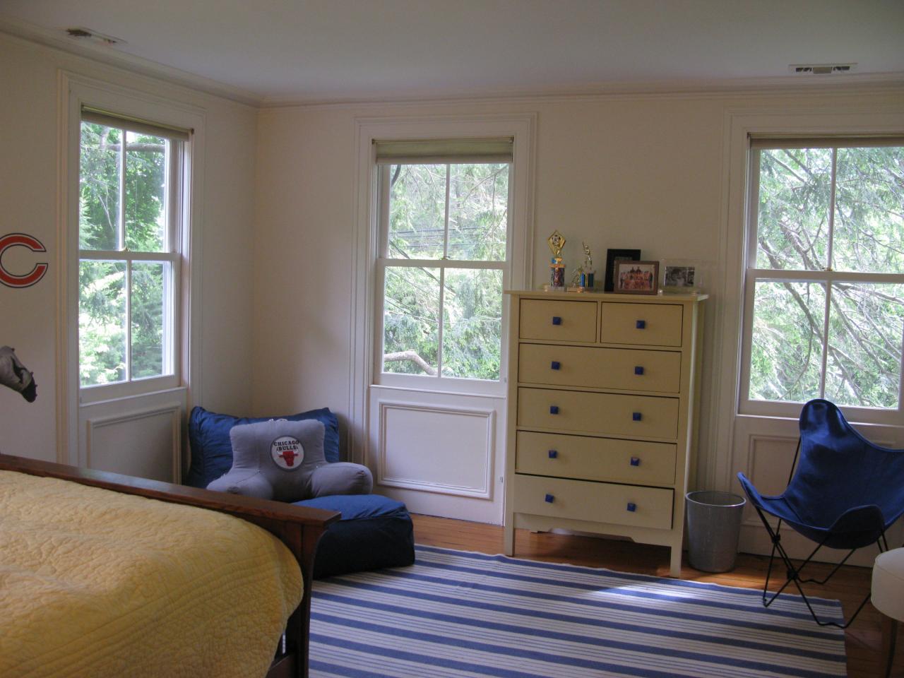 336 Ponus Ridge Road New Canaan, CT 06840 - Photo 18 of 28 a bed room with a bed and a window
