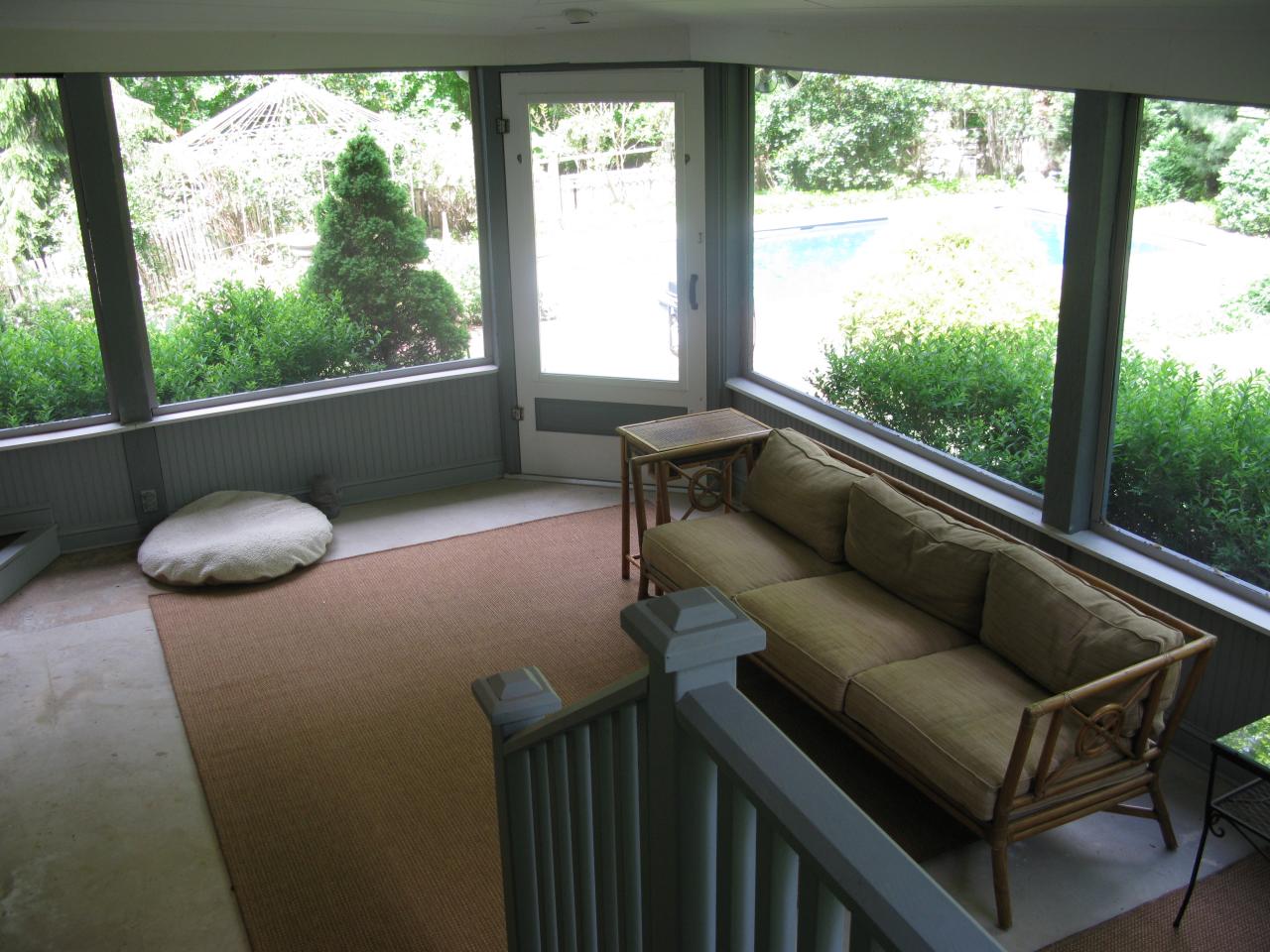 336 Ponus Ridge Road New Canaan, CT 06840 - Photo 20 of 28 a living room with furniture and a large window