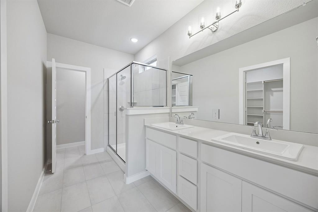 2109 Sunshining Road Princeton, TX 75407 - Photo 19 of 35 Primary Bathroom in the Stanley II home plan by Trophy Signature Homes – REPRESENTATIVE PHOTO