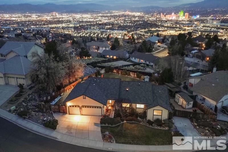 926 University Place Reno, NV 89512 - Photo 1 of 30 an aerial view of residential houses with city view