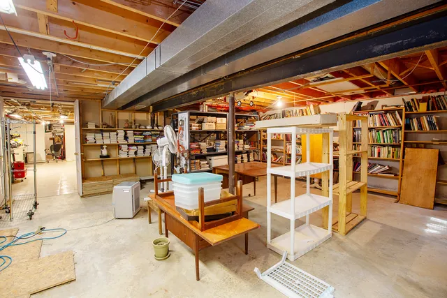 a room with refrigerator and washer