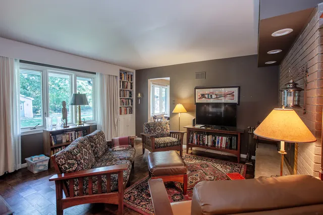 a living room with furniture and a window