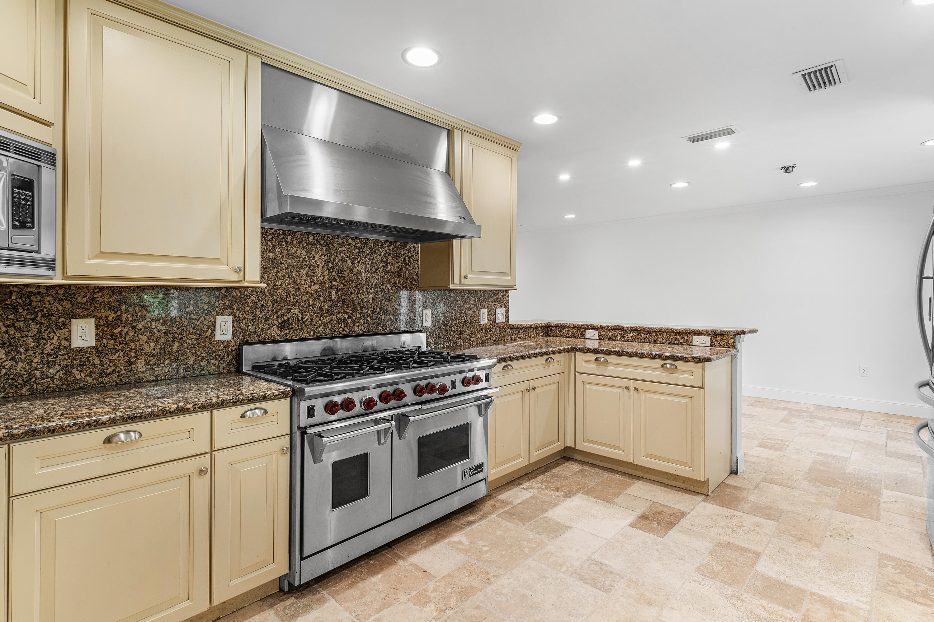 783 Valencia Drive Boca Raton, FL 33432 - Photo 15 of 45 a kitchen with a stove and a sink