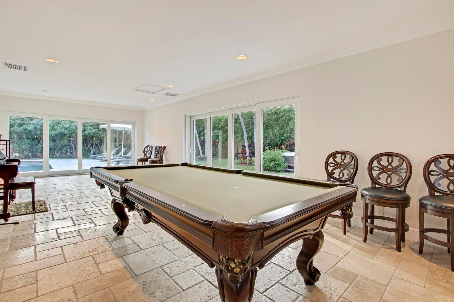783 Valencia Drive Boca Raton, FL 33432 - Photo 17 of 45 a room with chairs pool table and outdoor view
