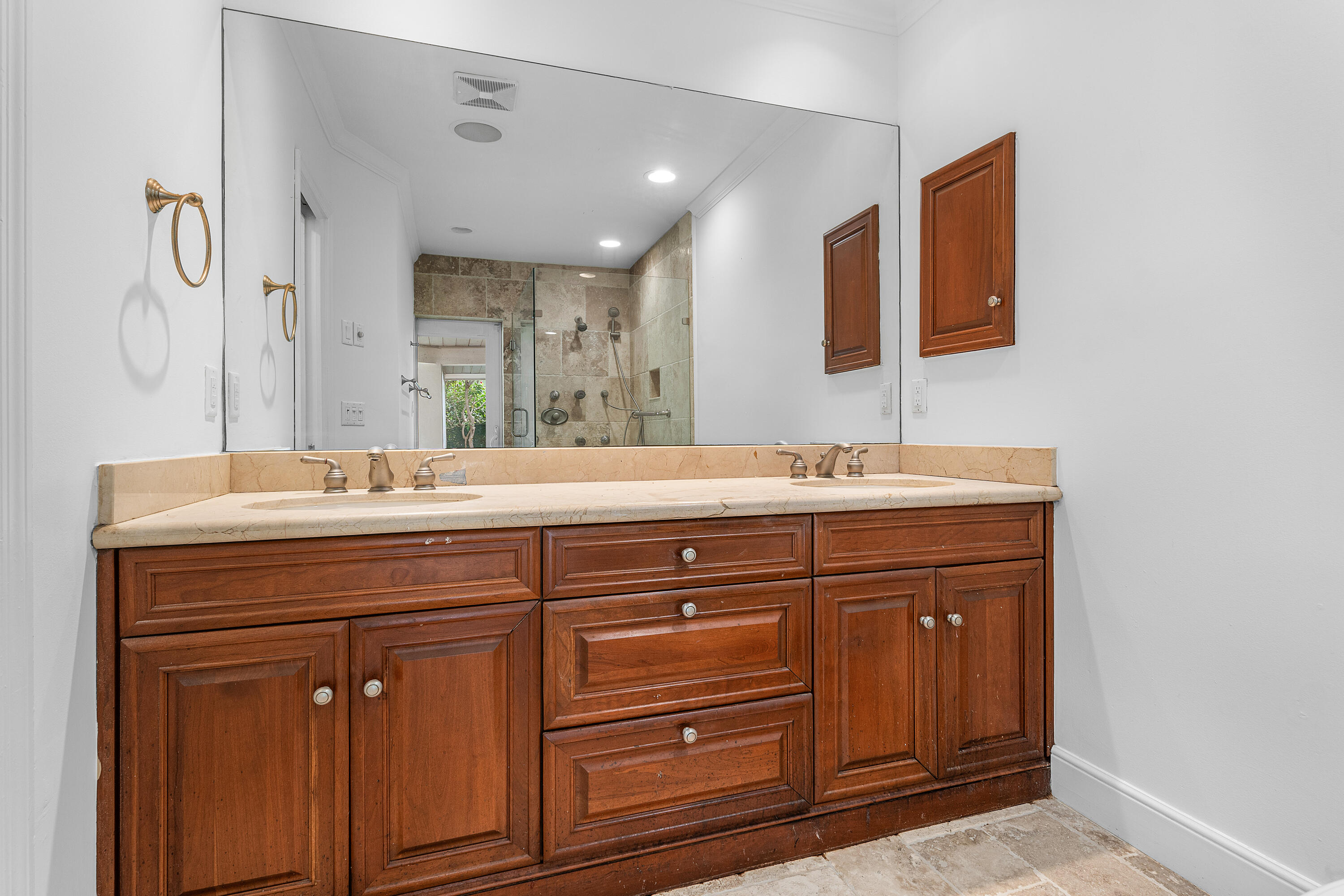 783 Valencia Drive Boca Raton, FL 33432 - Photo 27 of 45 a bathroom with a sink and a mirror