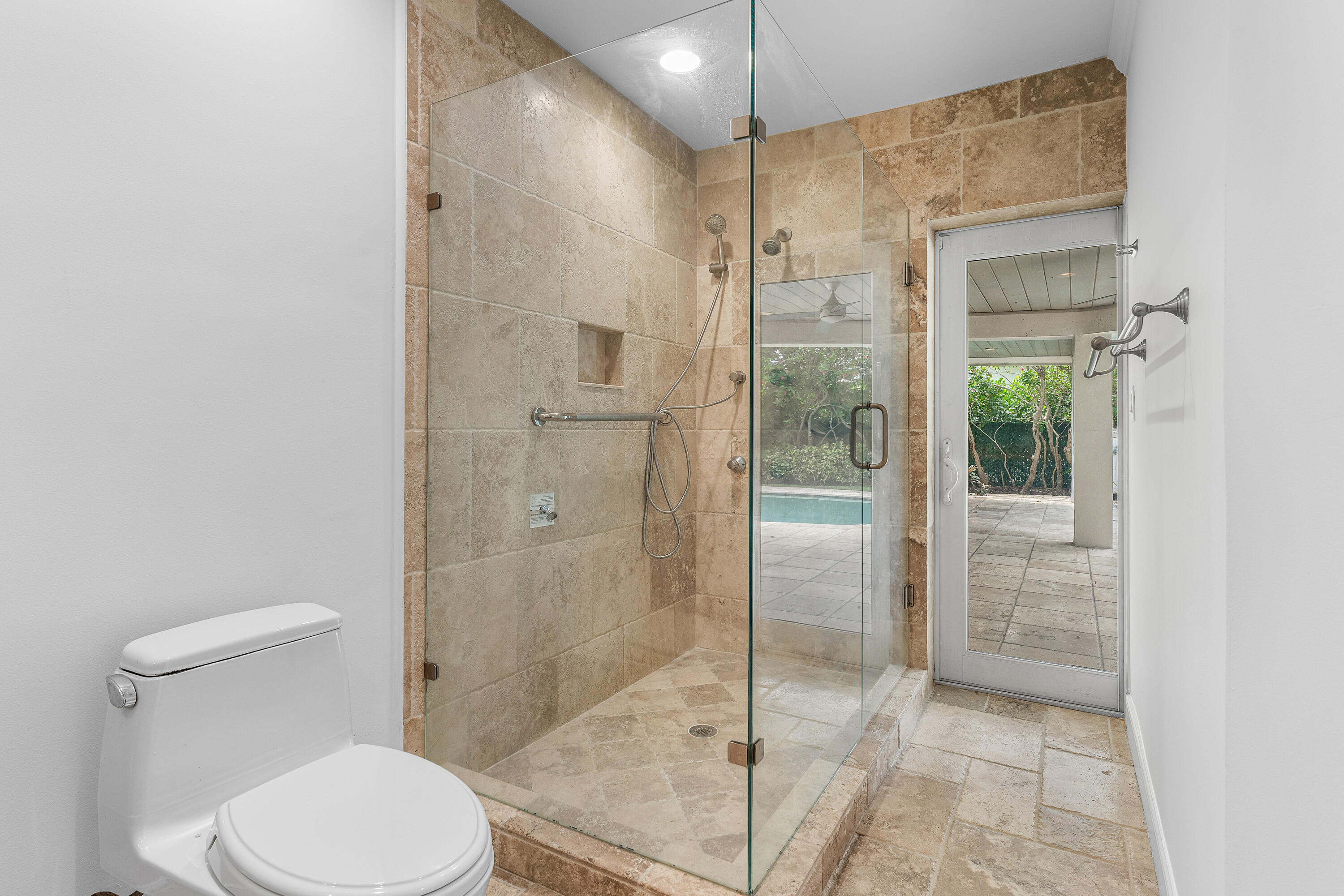783 Valencia Drive Boca Raton, FL 33432 - Photo 28 of 45 a bathroom with a shower and a toilet