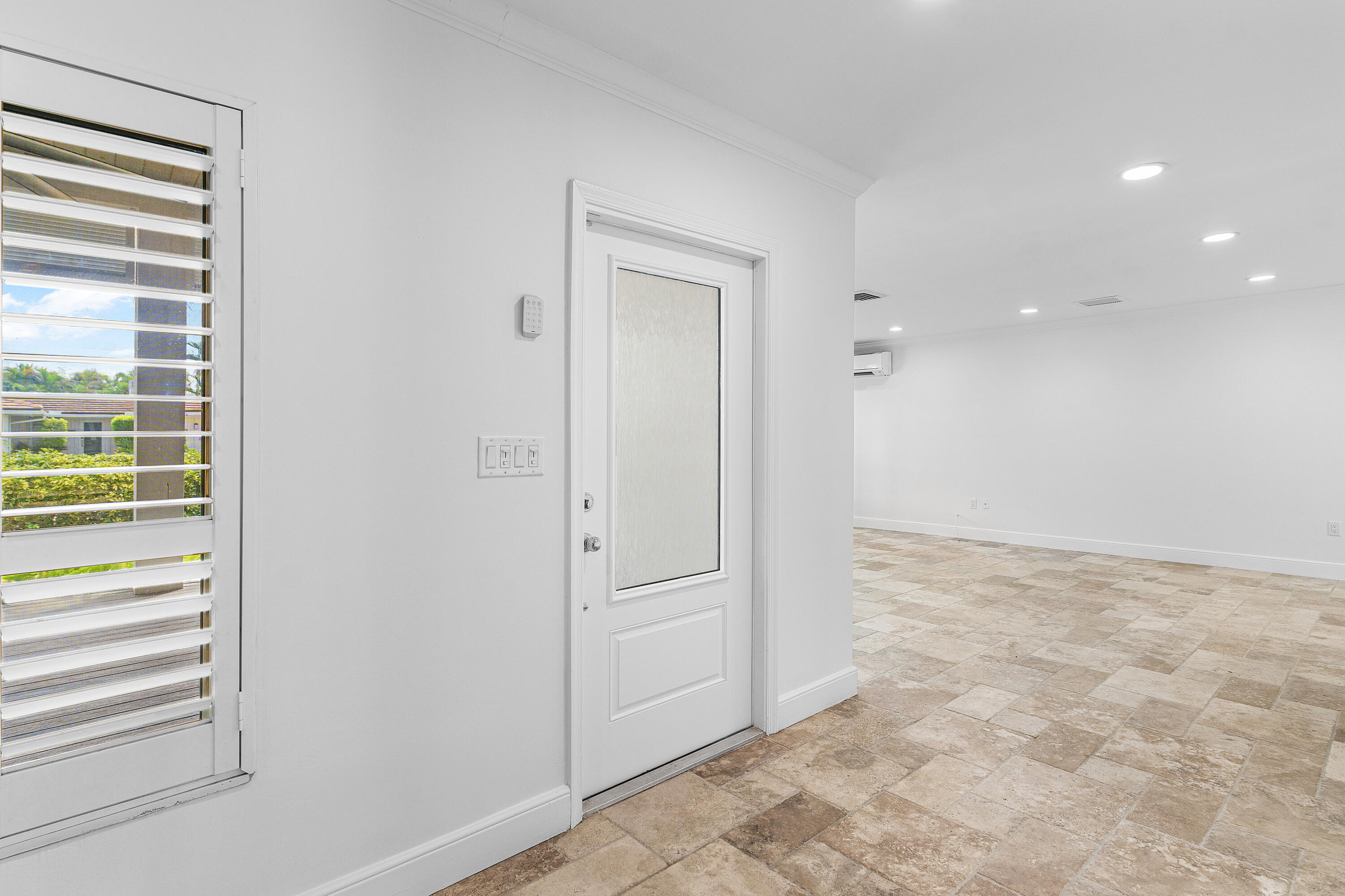 783 Valencia Drive Boca Raton, FL 33432 - Photo 6 of 45 a view of an empty room and a window