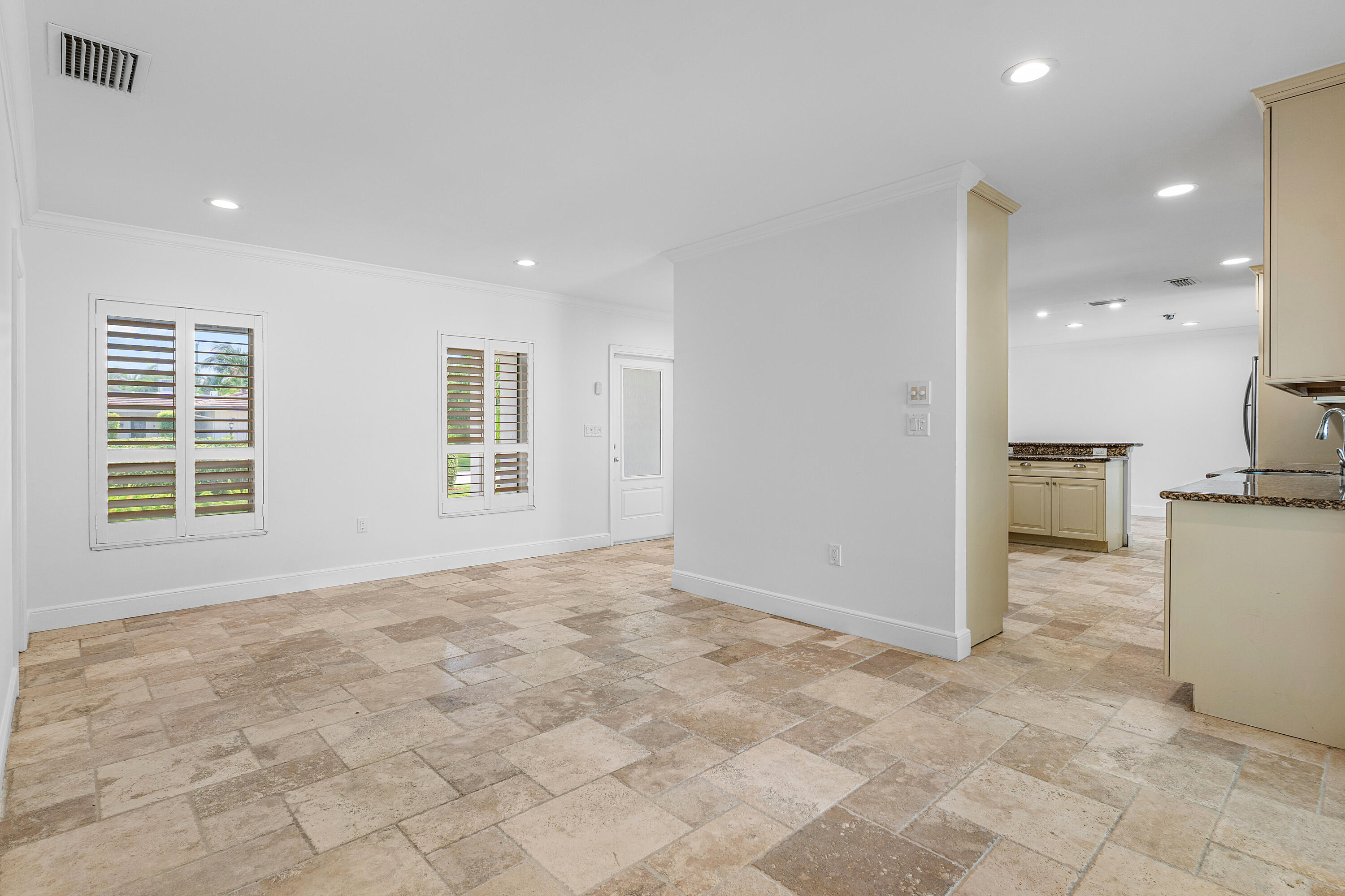 783 Valencia Drive Boca Raton, FL 33432 - Photo 8 of 45 a view of an empty room with a window