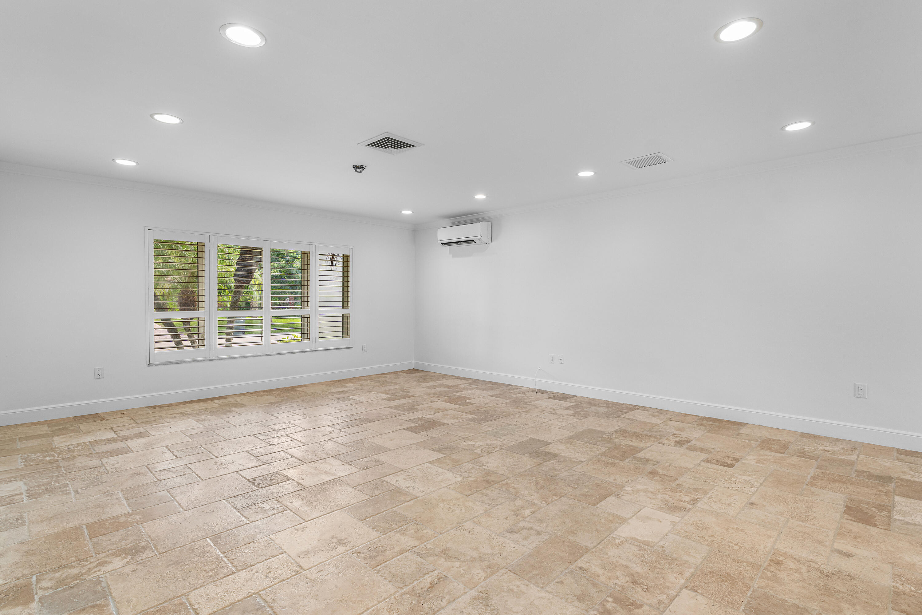 783 Valencia Drive Boca Raton, FL 33432 - Photo 9 of 45 a view of an empty room with a window