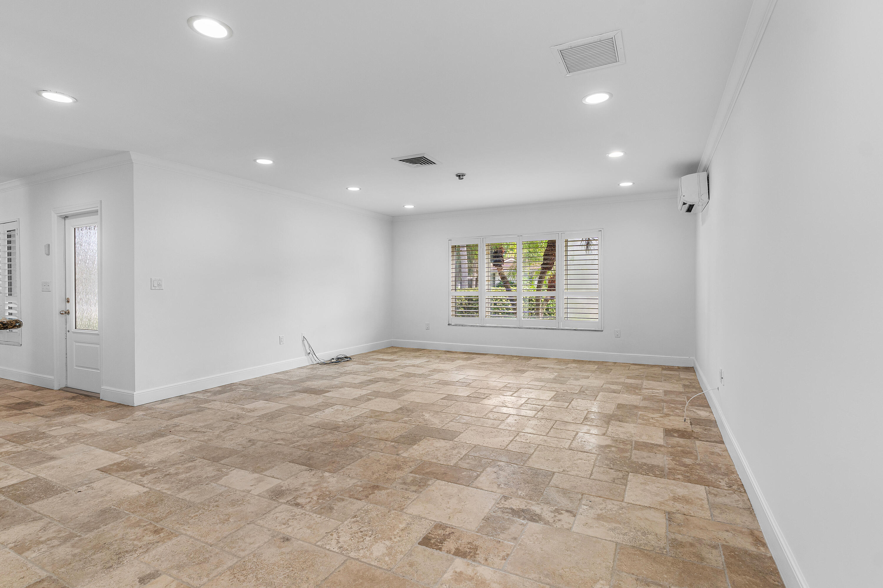 783 Valencia Drive Boca Raton, FL 33432 - Photo 10 of 45 a view of an empty room with a window