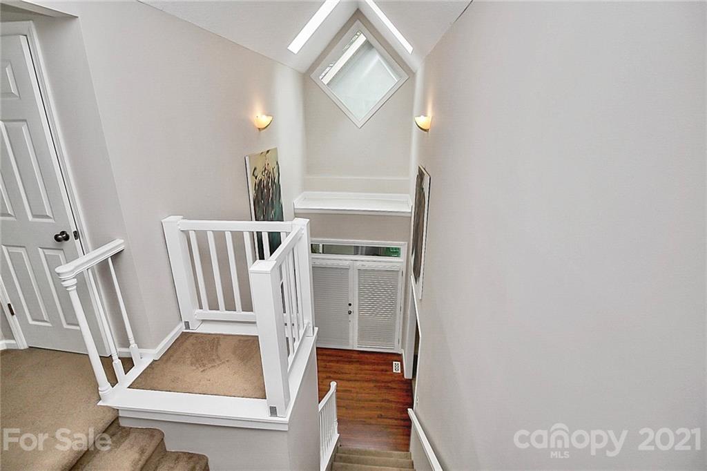 4900 Spring Lane Charlotte, NC 28213 - Photo 17 of 31 a view of front door and bedroom
