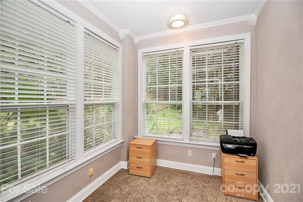 4900 Spring Lane Charlotte, NC 28213 - Photo 19 of 31 a room with a bed and a window