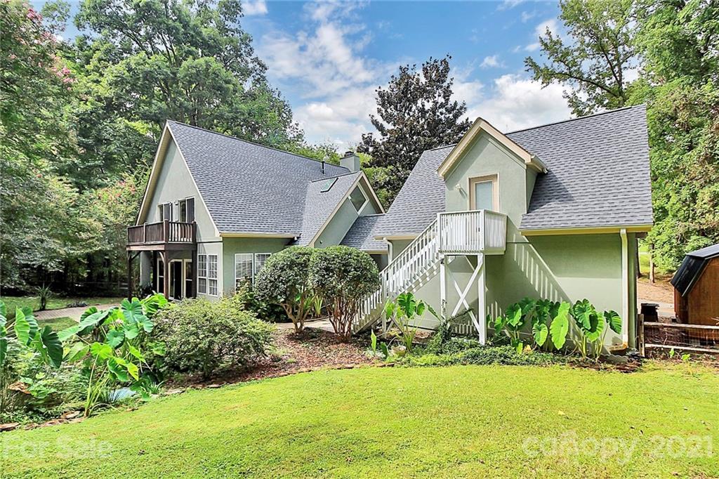 4900 Spring Lane Charlotte, NC 28213 - Photo 24 of 31 a front view of house with yard and green space