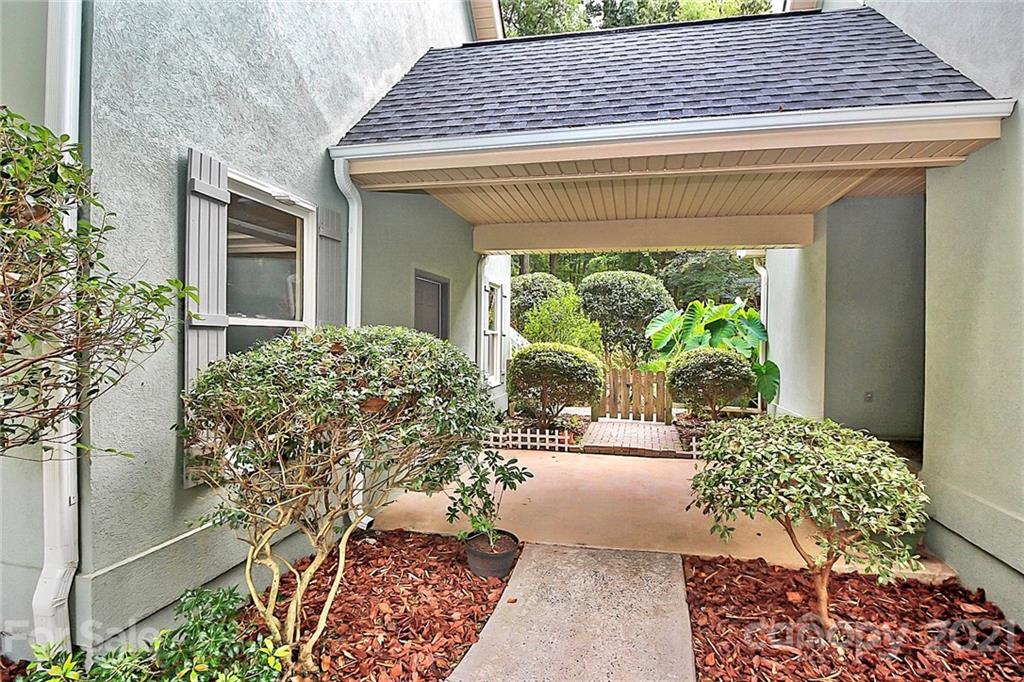 4900 Spring Lane Charlotte, NC 28213 - Photo 29 of 31 a front view of a house with garden