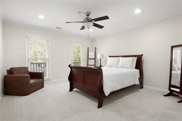 a media room with lots of chairs and a projector screen