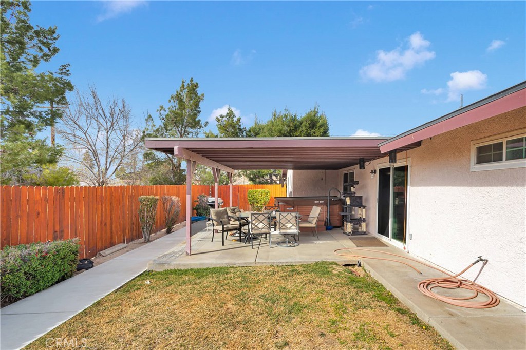 14190 Tehachapi Road Apple Valley, CA 92307 - Photo 32 of 39 a view of a swimming pool with a patio
