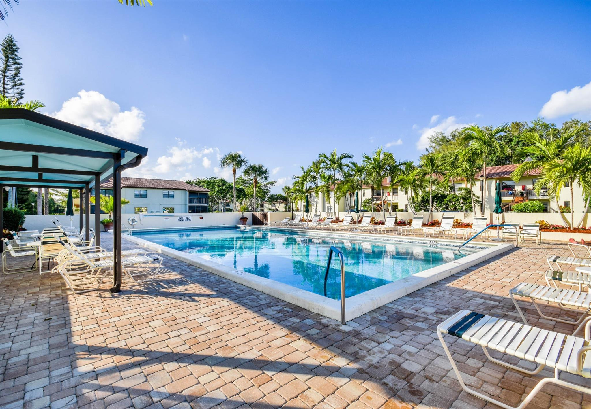 21668 Arriba Real, Unit 43A Boca Raton, FL 33433 - Photo 13 of 42 Heated community pool