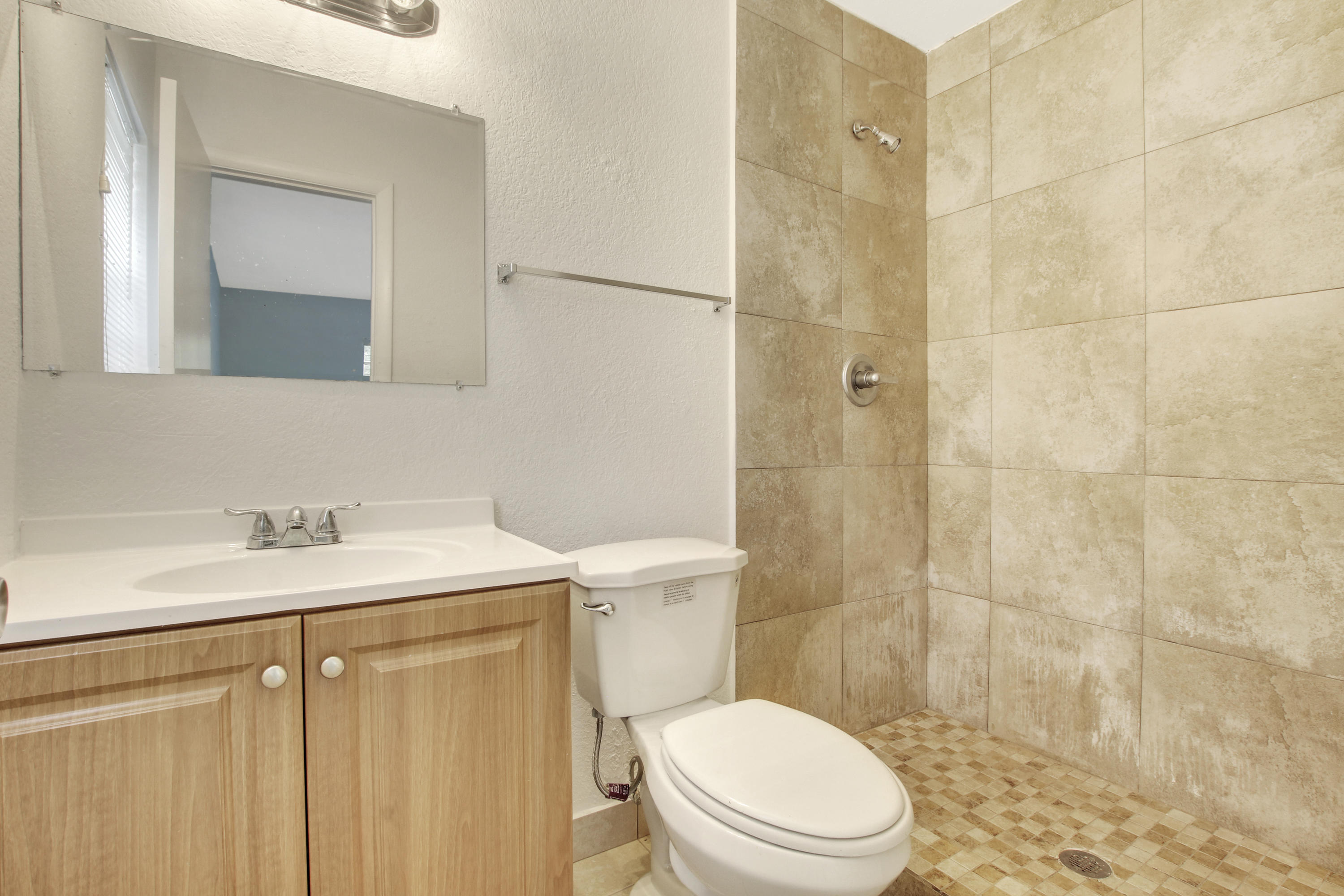 1919 Doffer Lane, Unit 1933 Juno Ridge, FL 33408 - Photo 8 of 13 bathroom