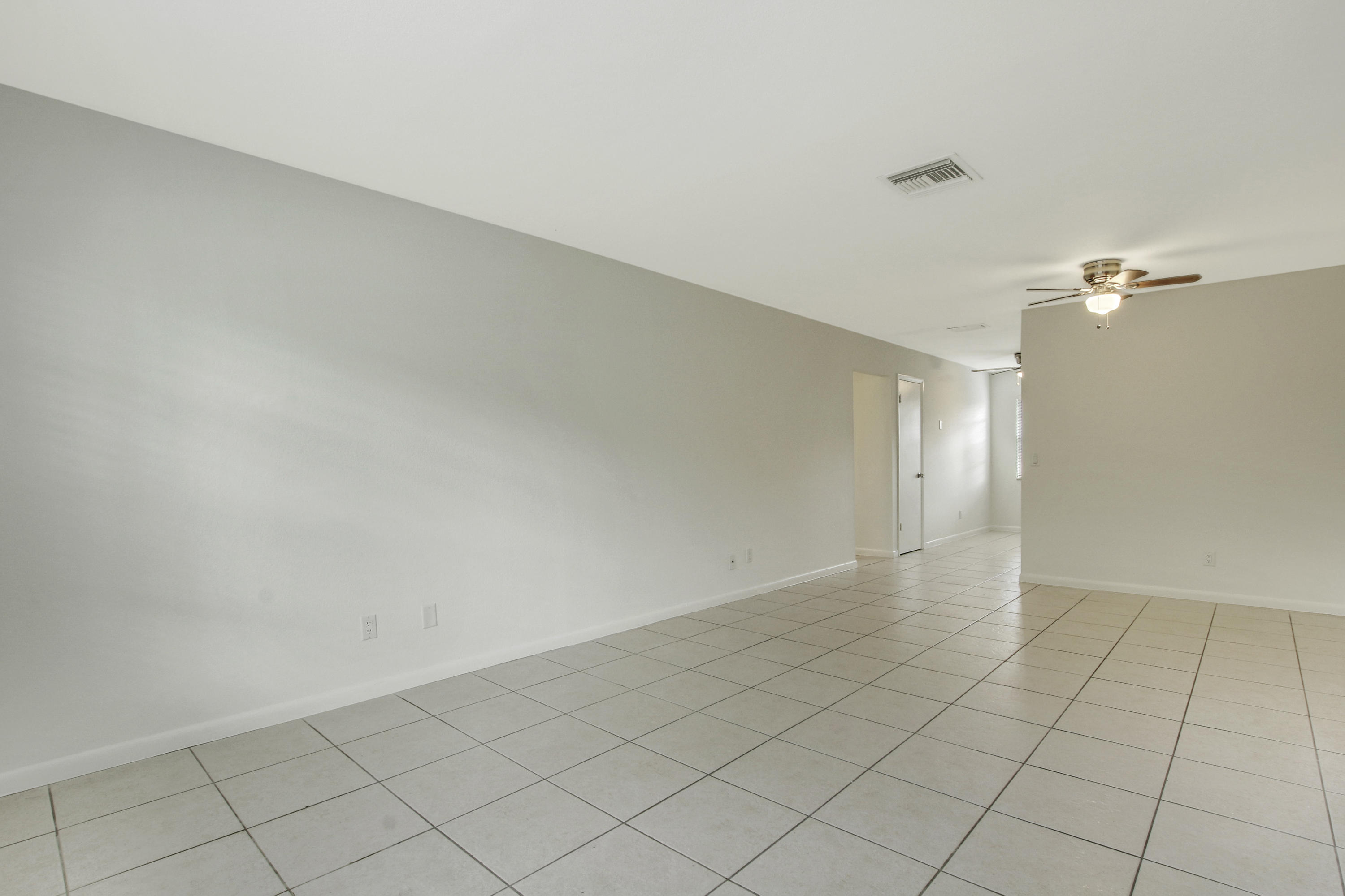 1919 Doffer Lane, Unit 1933 Juno Ridge, FL 33408 - Photo 9 of 13 Living