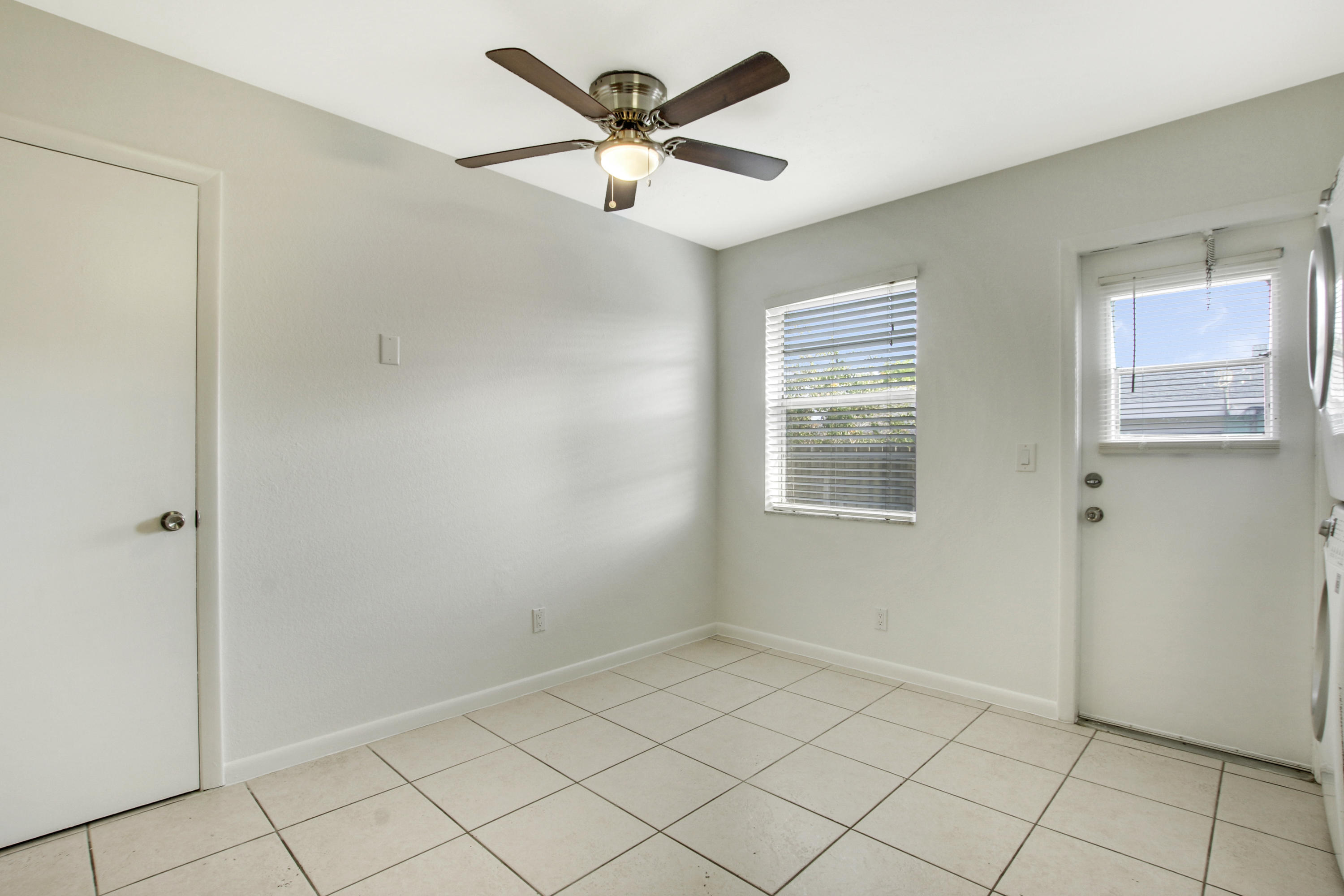 1919 Doffer Lane, Unit 1933 Juno Ridge, FL 33408 - Photo 10 of 13 front door