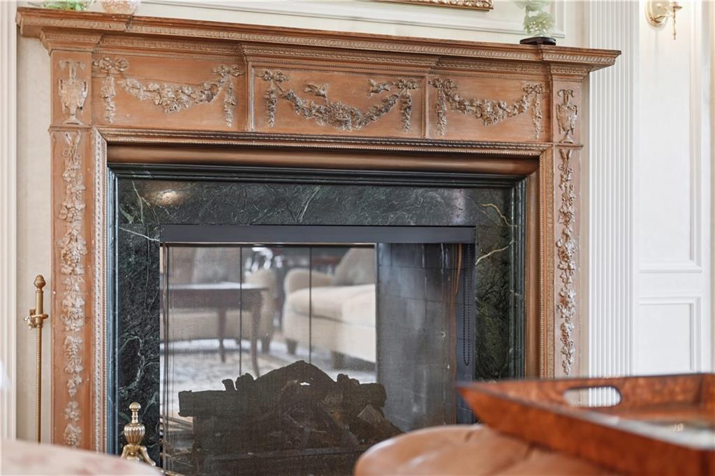 600 Backbone Road Sewickley, PA 15143 - Photo 11 of 50 A carved mantel creates a handsome focal point and adds richness and character to the living room. The architectural detail gives the space a sense of permanence and charm.