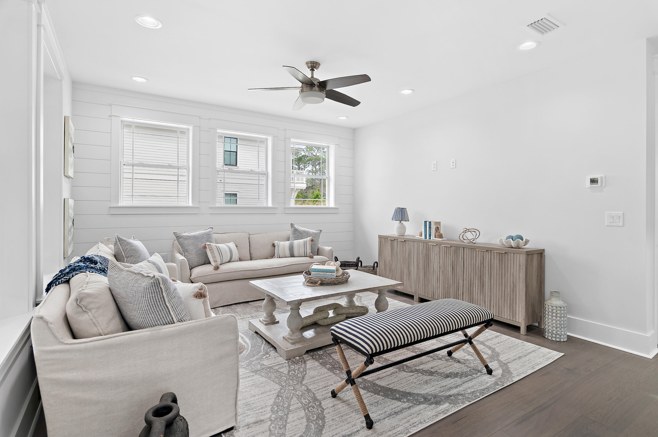 171 Redbud Ln Inlet Beach Inlet Beach, FL 32461 - Photo 15 of 37 a living room with furniture and a ceiling fan