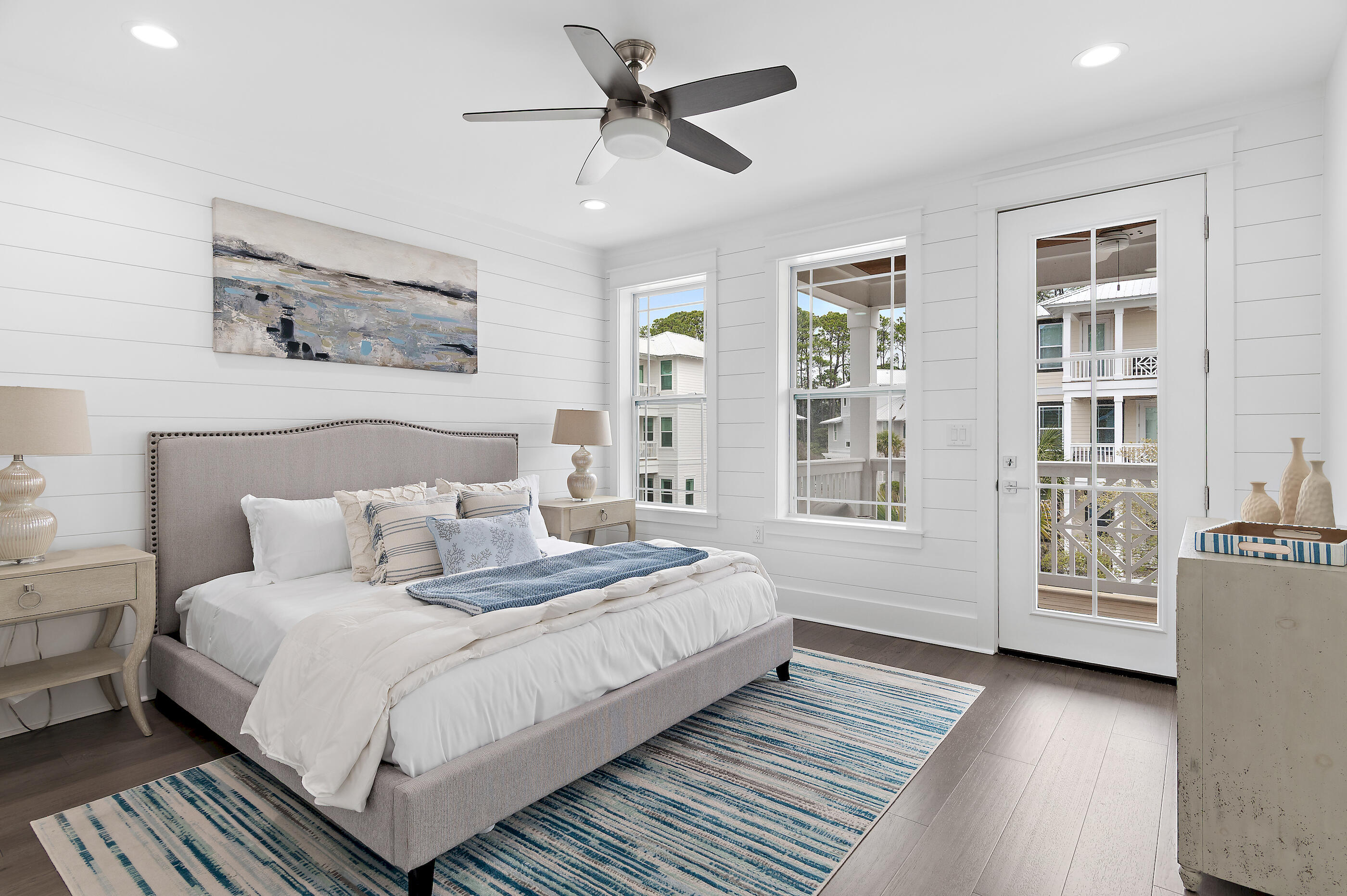 171 Redbud Ln Inlet Beach Inlet Beach, FL 32461 - Photo 18 of 37 a bedroom with a large bed closet and three windows