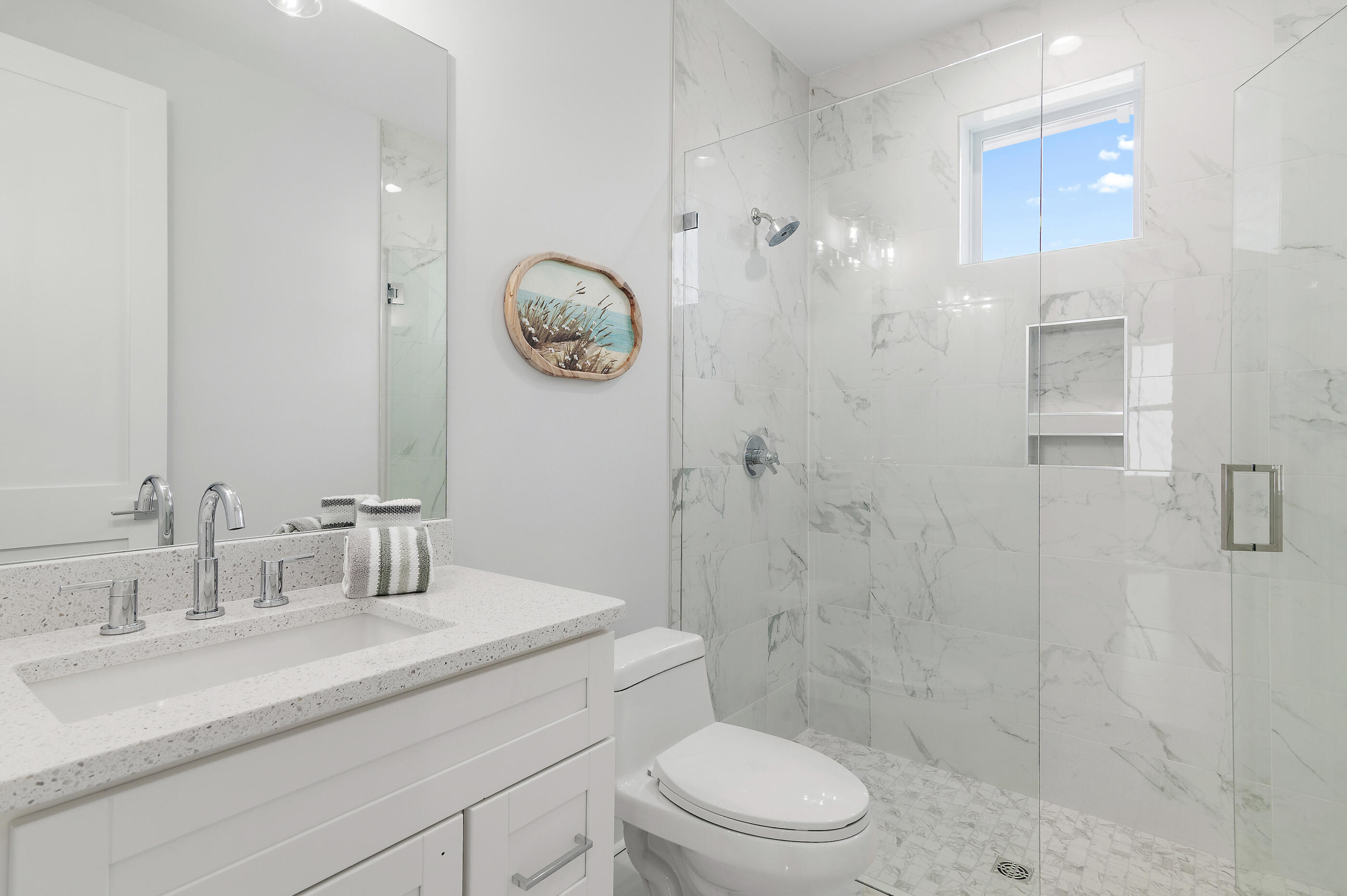 171 Redbud Ln Inlet Beach Inlet Beach, FL 32461 - Photo 24 of 37 a bathroom with a sink a toilet and shower