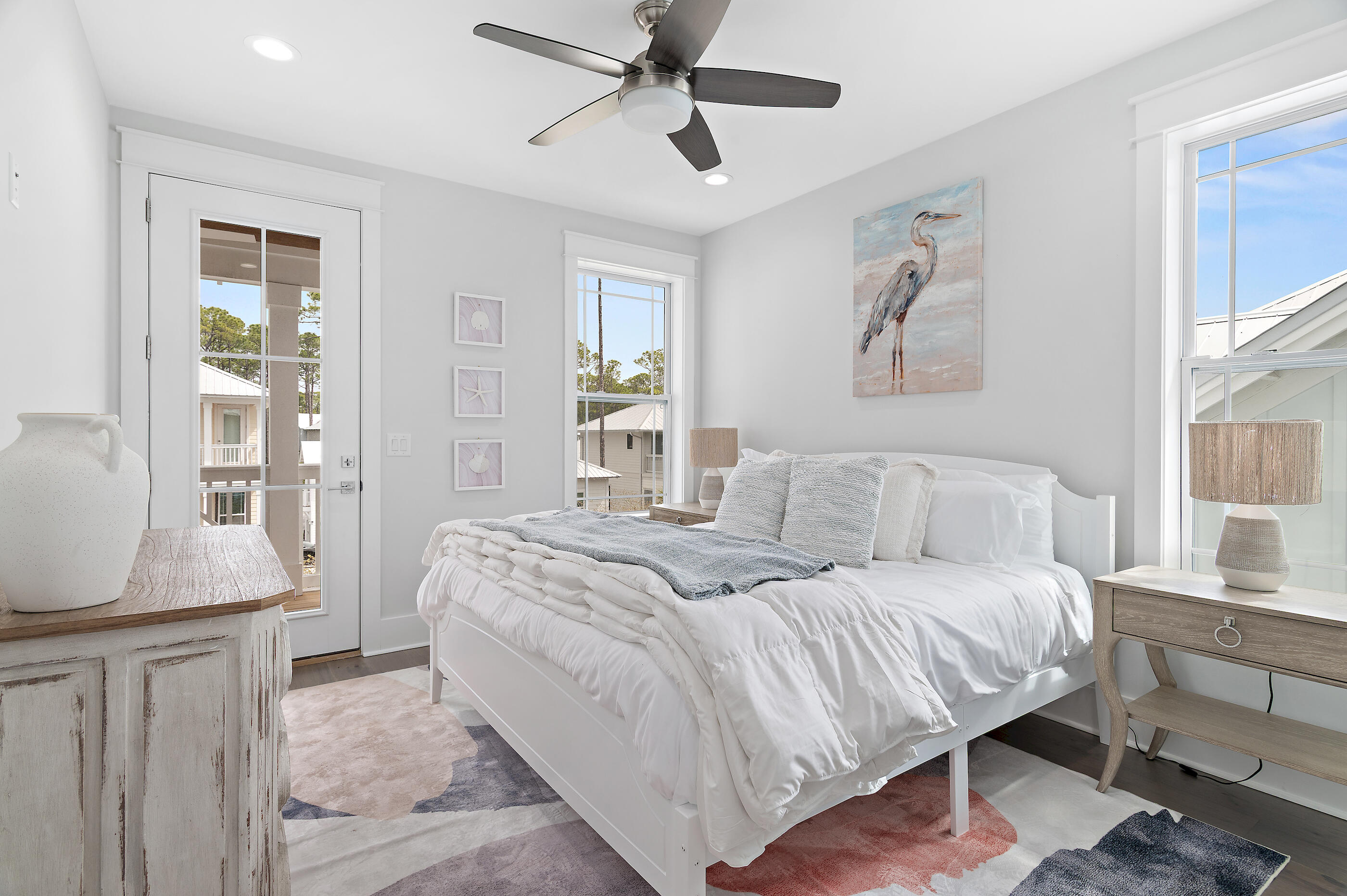 171 Redbud Ln Inlet Beach Inlet Beach, FL 32461 - Photo 26 of 37 a bedroom with a large bed and a window