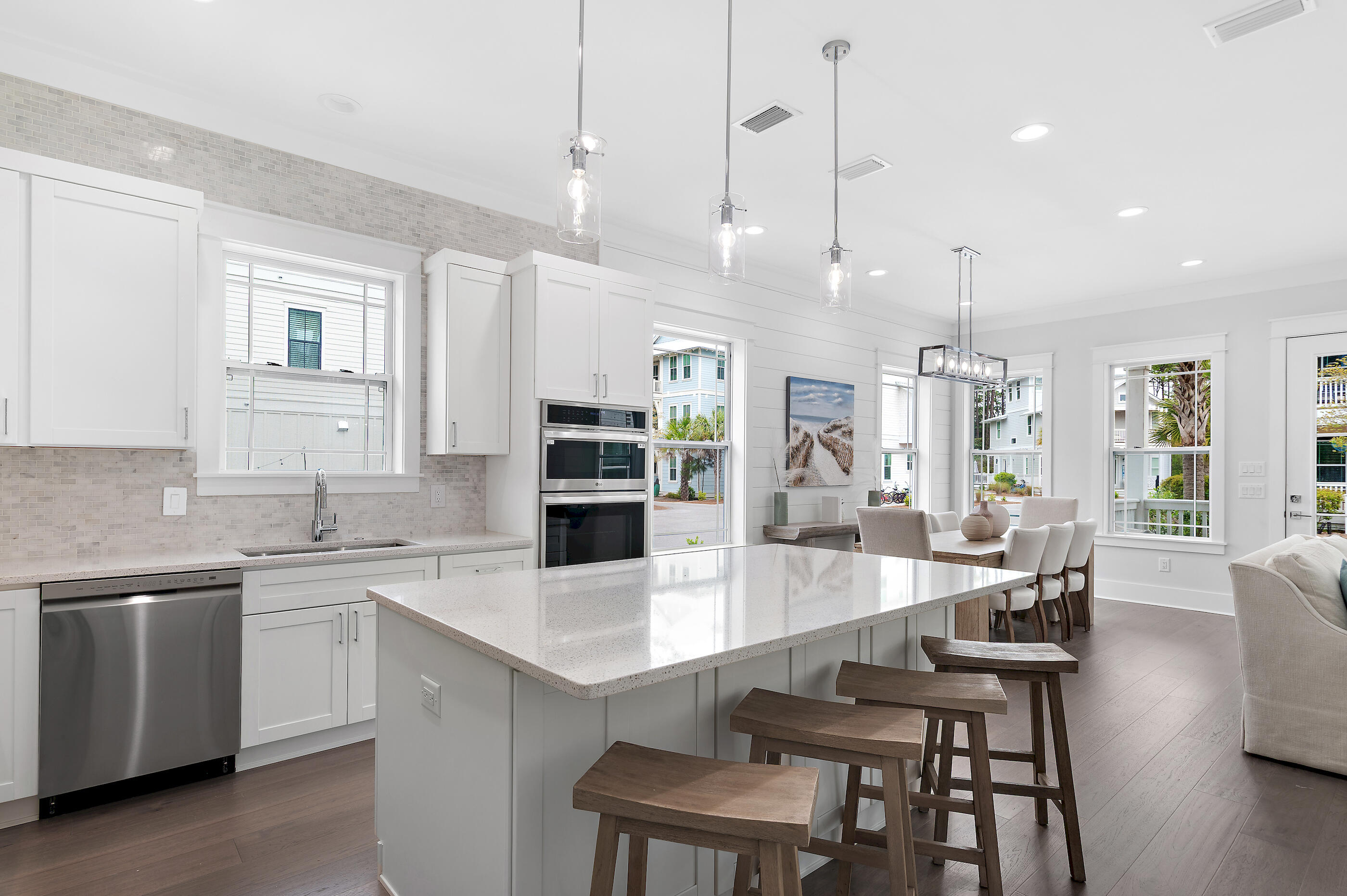 171 Redbud Ln Inlet Beach Inlet Beach, FL 32461 - Photo 8 of 37 a large kitchen with a table and chairs