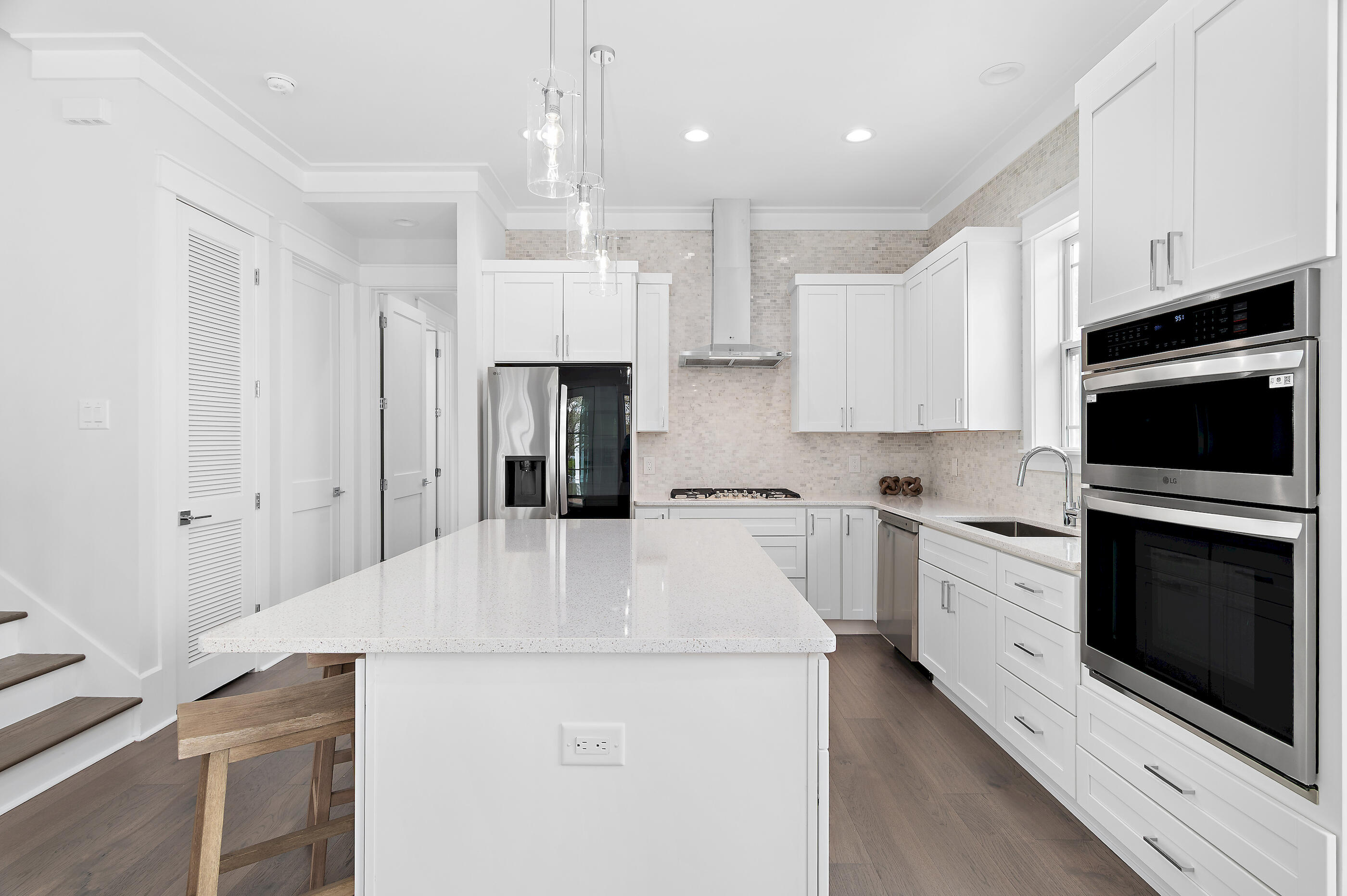 171 Redbud Ln Inlet Beach Inlet Beach, FL 32461 - Photo 10 of 37 a large white kitchen with stainless steel appliances