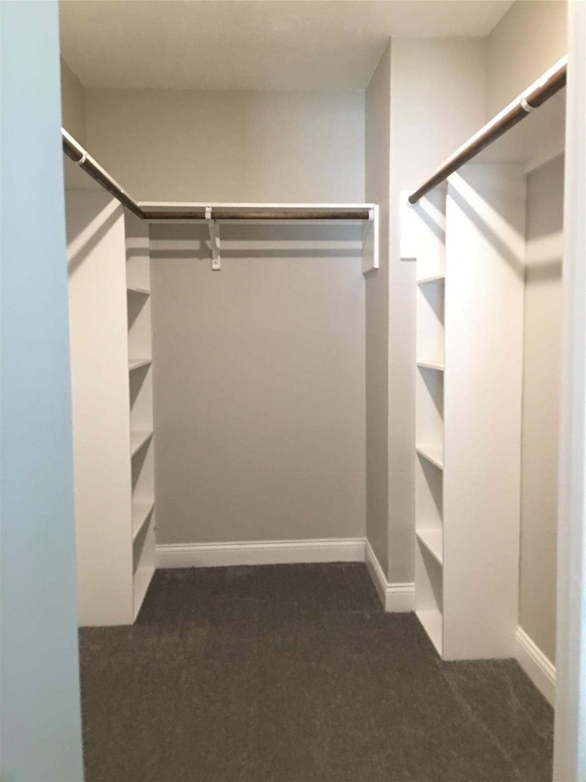 415 Sevenhampton Lane Houston, TX 77015 - Photo 19 of 32 a view of an empty walk in closet