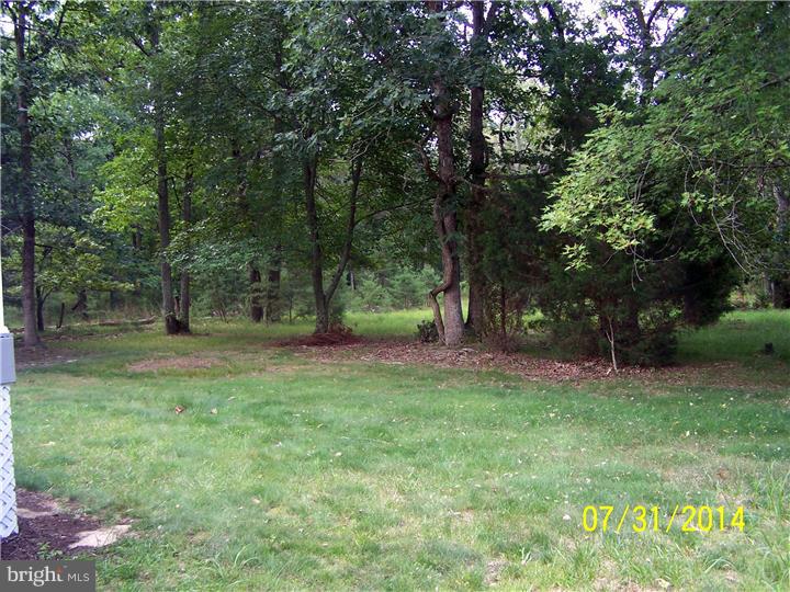 224 Friendship Road Southampton, NJ 08088 - Photo 11 of 11 a view of outdoor space with deck and yard