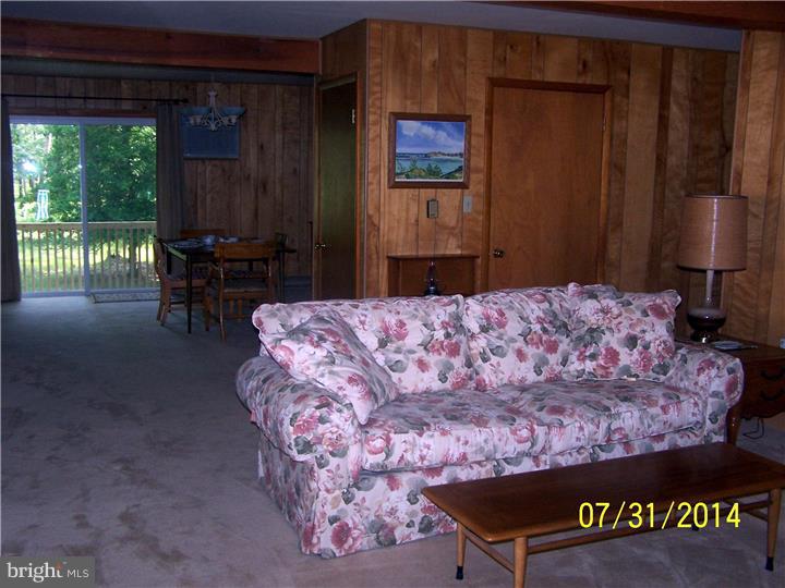 224 Friendship Road Southampton, NJ 08088 - Photo 4 of 11 a bed sitting in a bedroom next to a window