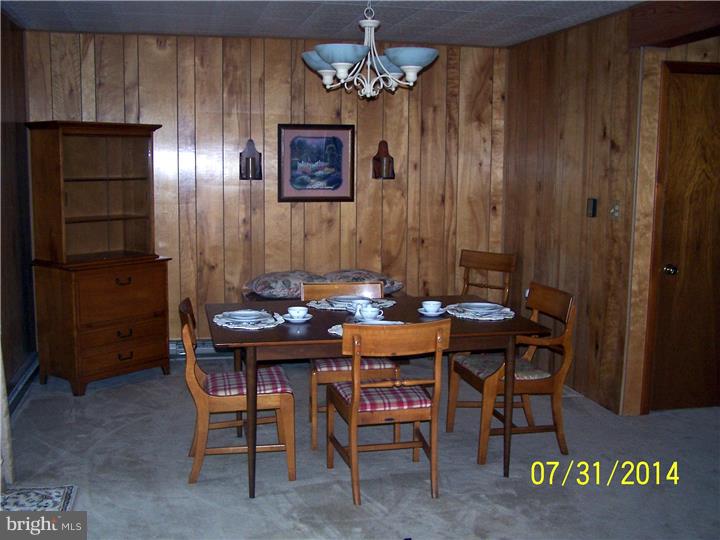 224 Friendship Road Southampton, NJ 08088 - Photo 6 of 11 a view of a dining room with furniture and chandelier