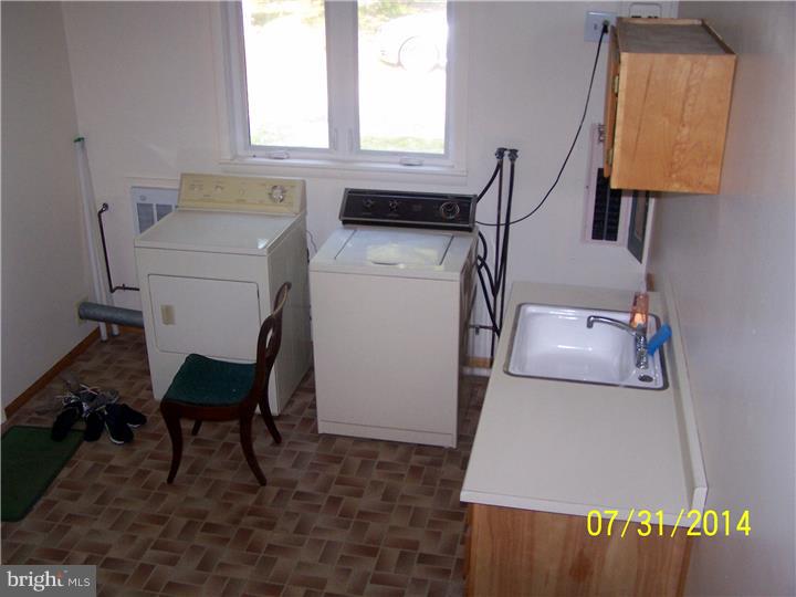 224 Friendship Road Southampton, NJ 08088 - Photo 7 of 11 a room with a chair and a window