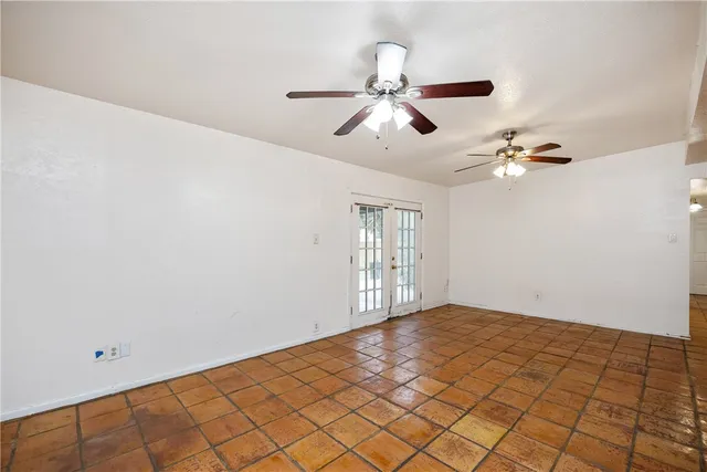 a view of an empty room and window