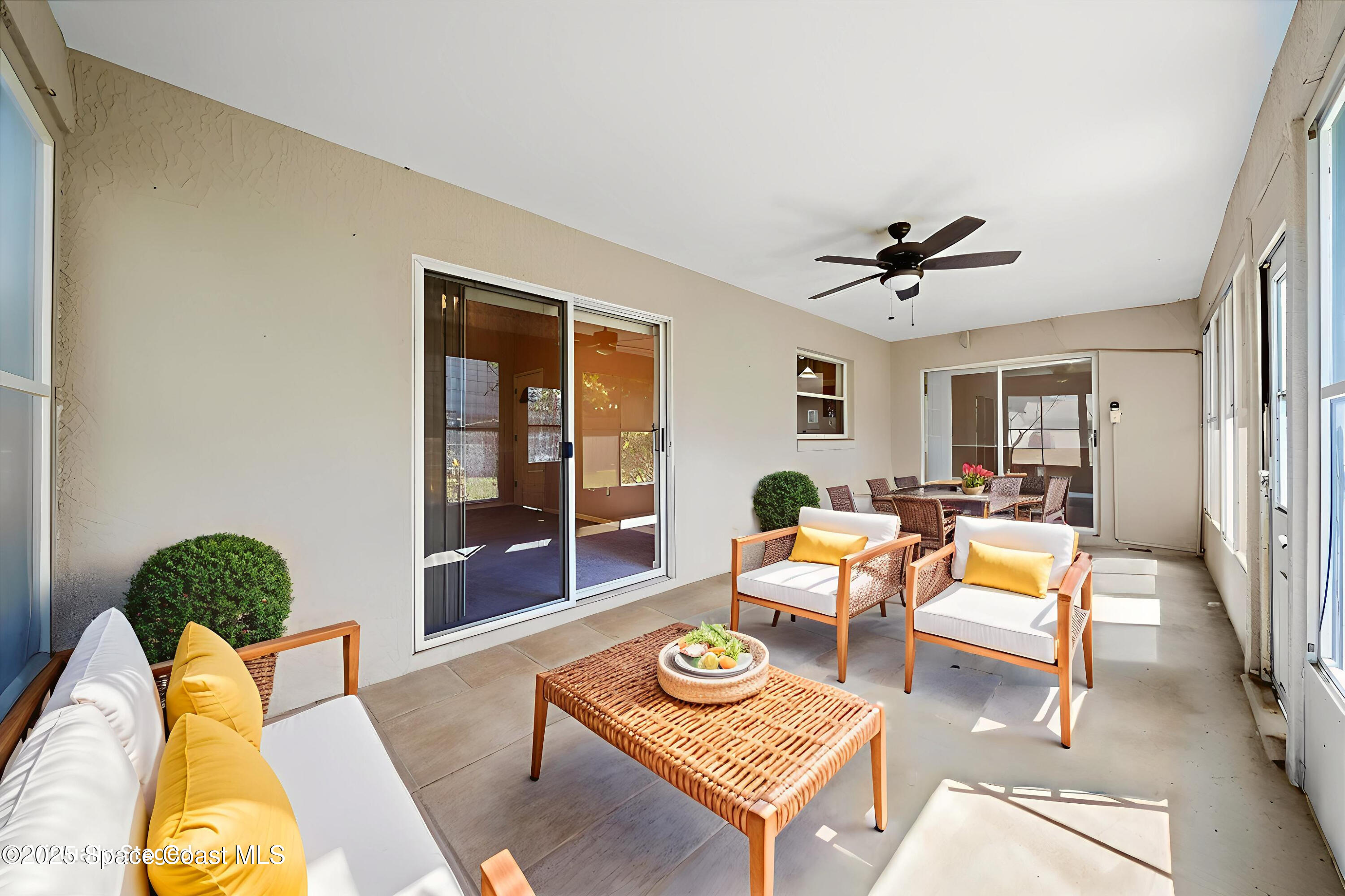 875 Evergreen Place Rockledge, FL 32955 - Photo 20 of 27 a living room with furniture and a window