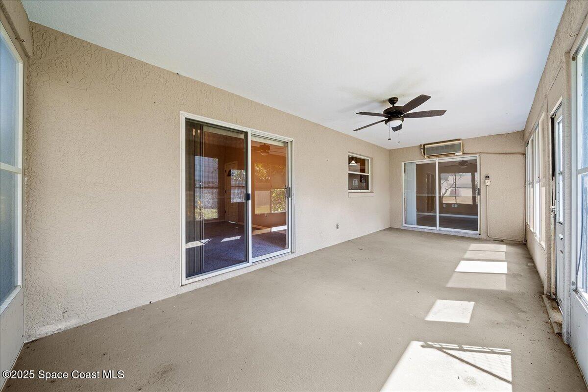 875 Evergreen Place Rockledge, FL 32955 - Photo 21 of 27 a view of an empty room with a window