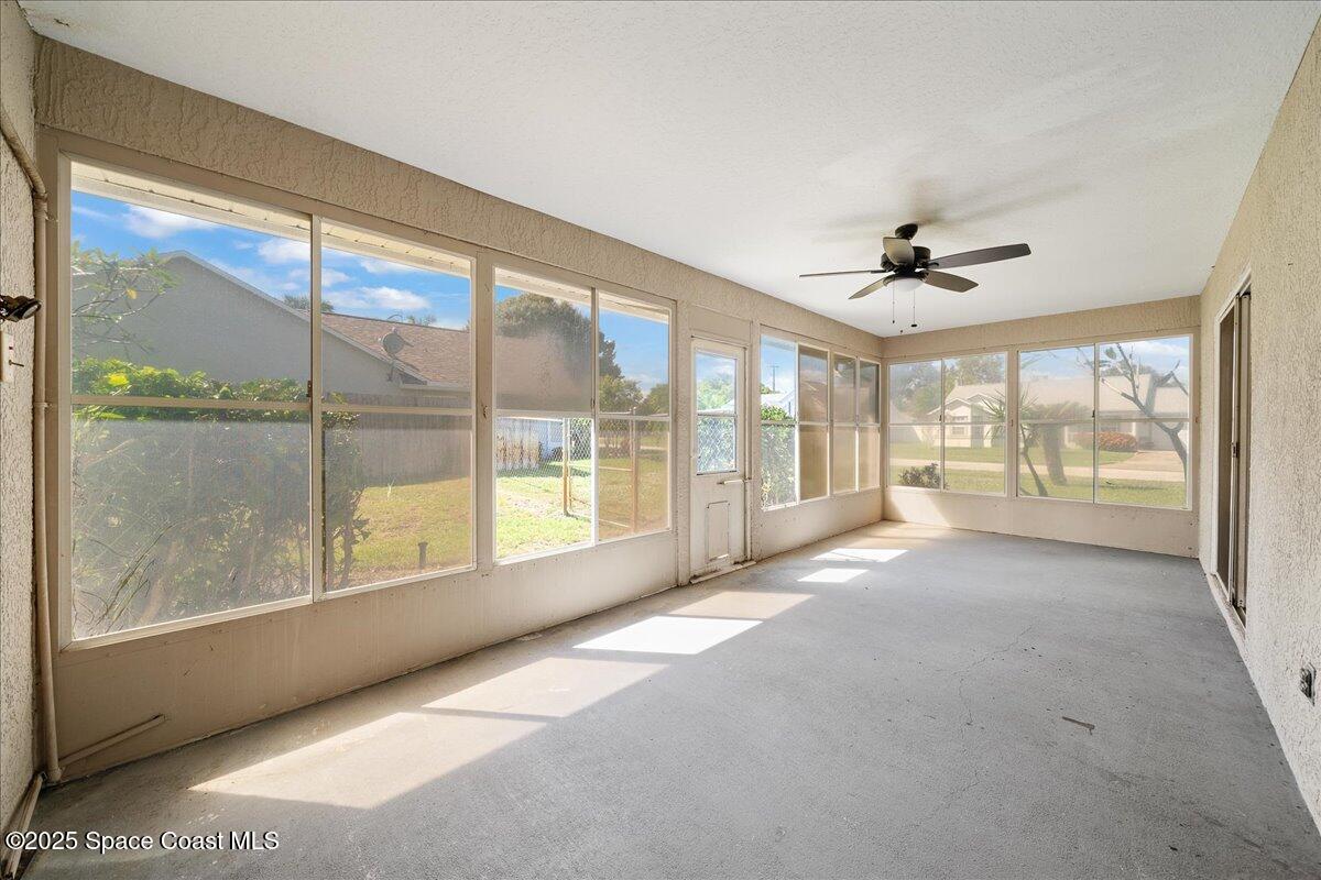 875 Evergreen Place Rockledge, FL 32955 - Photo 22 of 27 a view of an empty room with a window