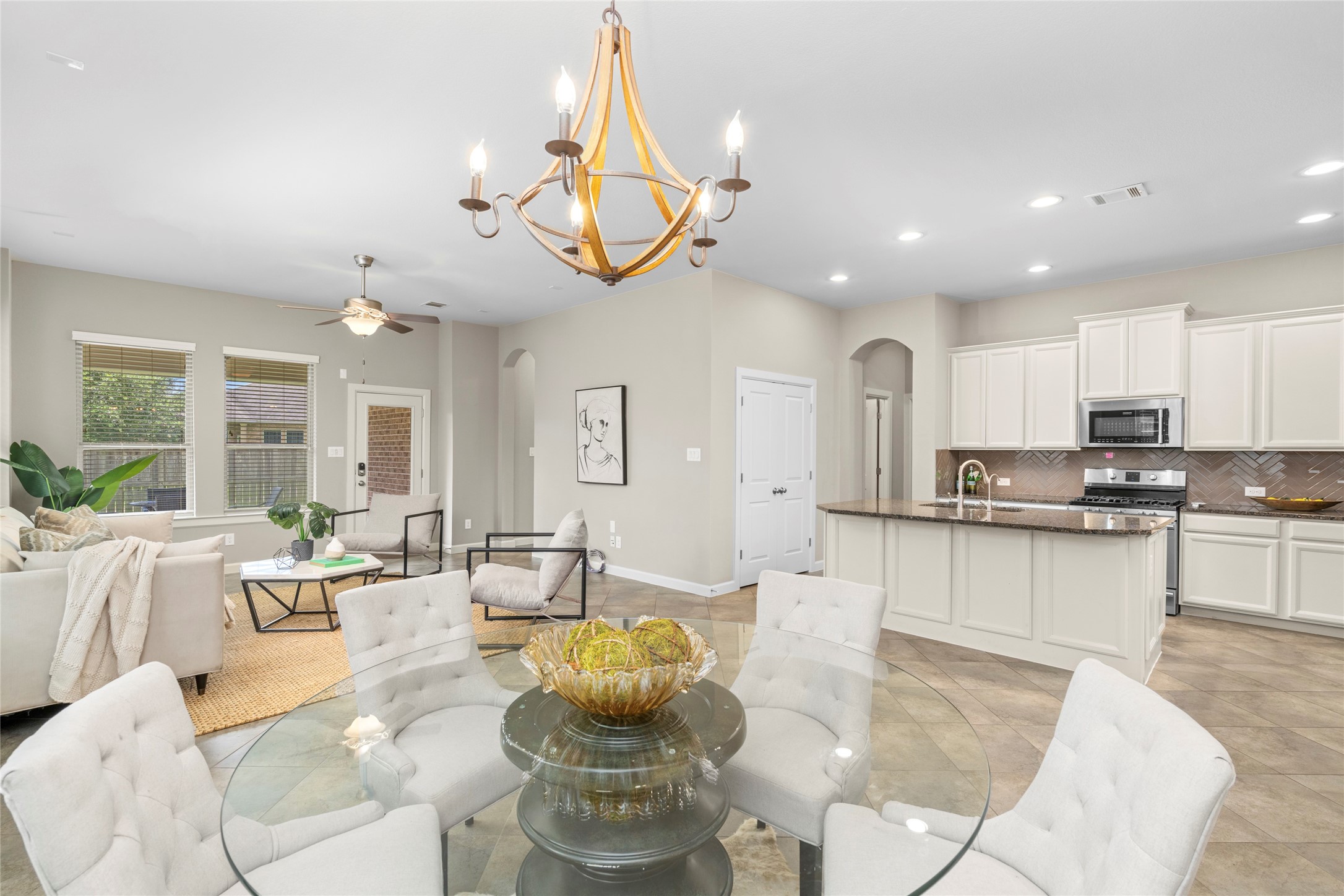 143 Castlegate Lane Houston, TX 77065 - Photo 6 of 33 A bit of elegant living with this elevated 2020 light fixture with LED bulbs.