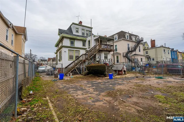 a front view of a house with street