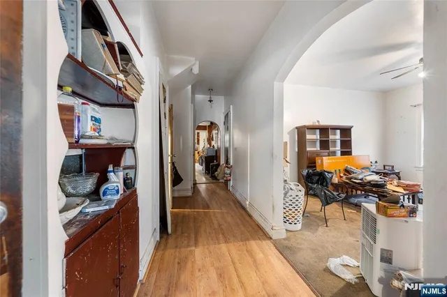 a kitchen view of a dining table chairs and entryway