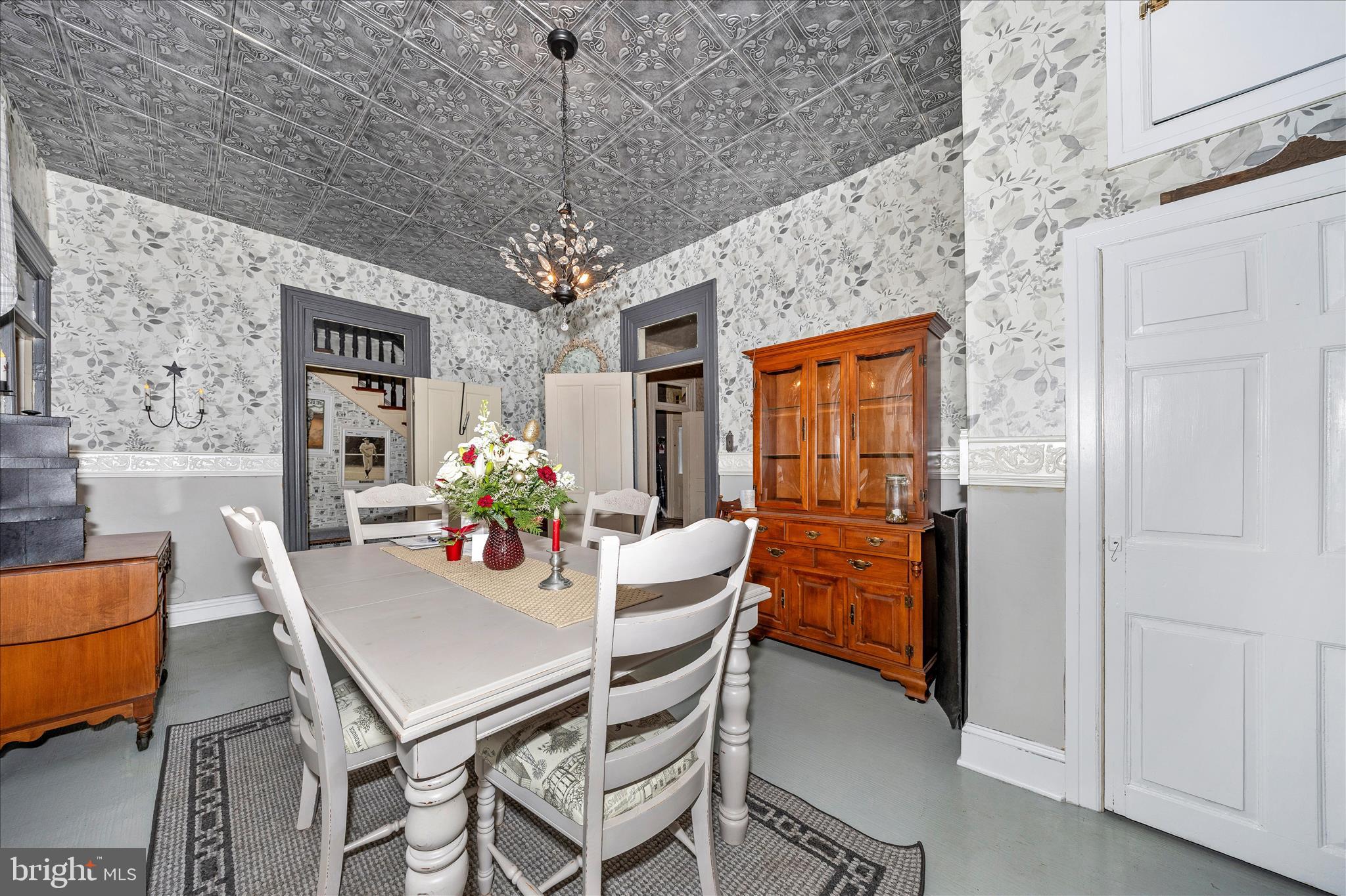 30 West Potomac Street Williamsport, MD 21795 - Photo 11 of 52 a dining room with furniture a chandelier and window
