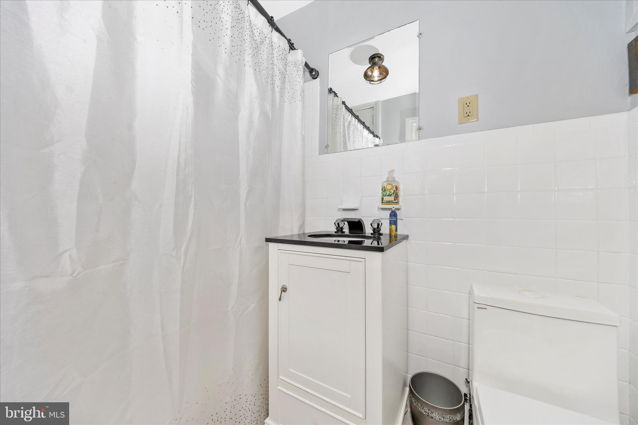 30 West Potomac Street Williamsport, MD 21795 - Photo 20 of 52 a view of storage and utility room with racks on the wall