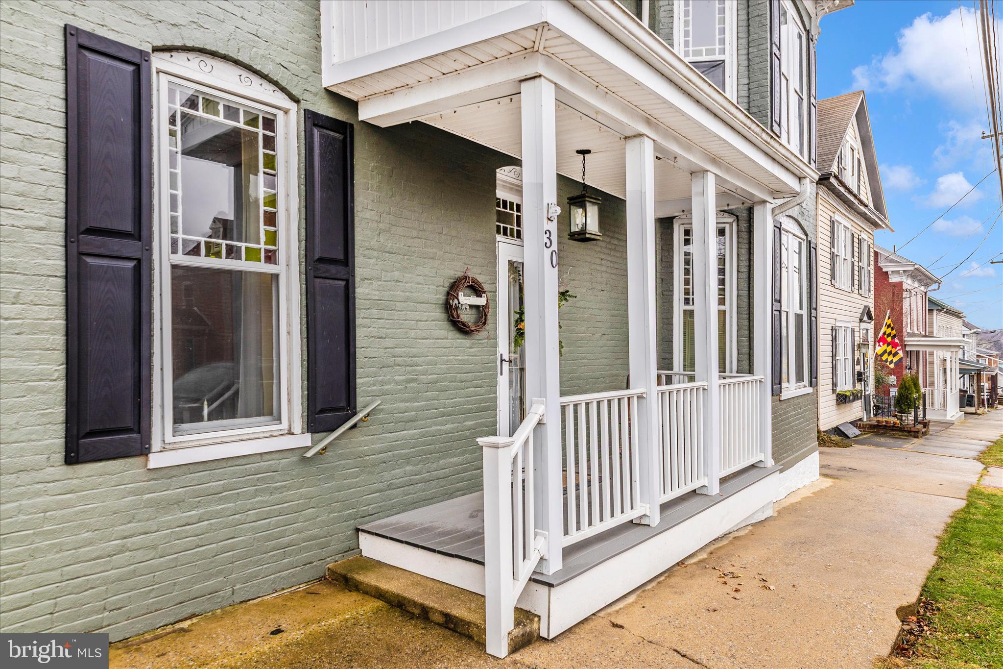 30 West Potomac Street Williamsport, MD 21795 - Photo 41 of 52 a view of a house with a door and a porch