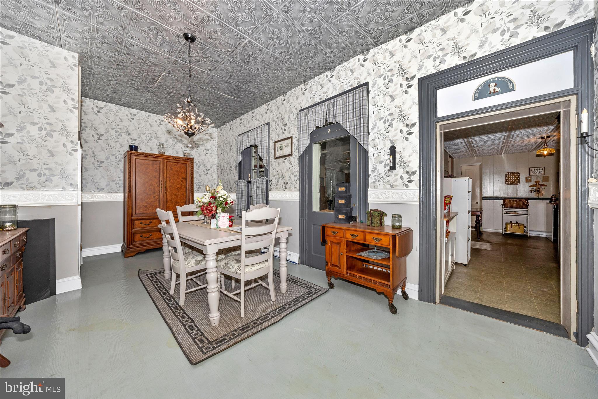 30 West Potomac Street Williamsport, MD 21795 - Photo 9 of 52 a dining room with furniture chandelier and a kitchen view