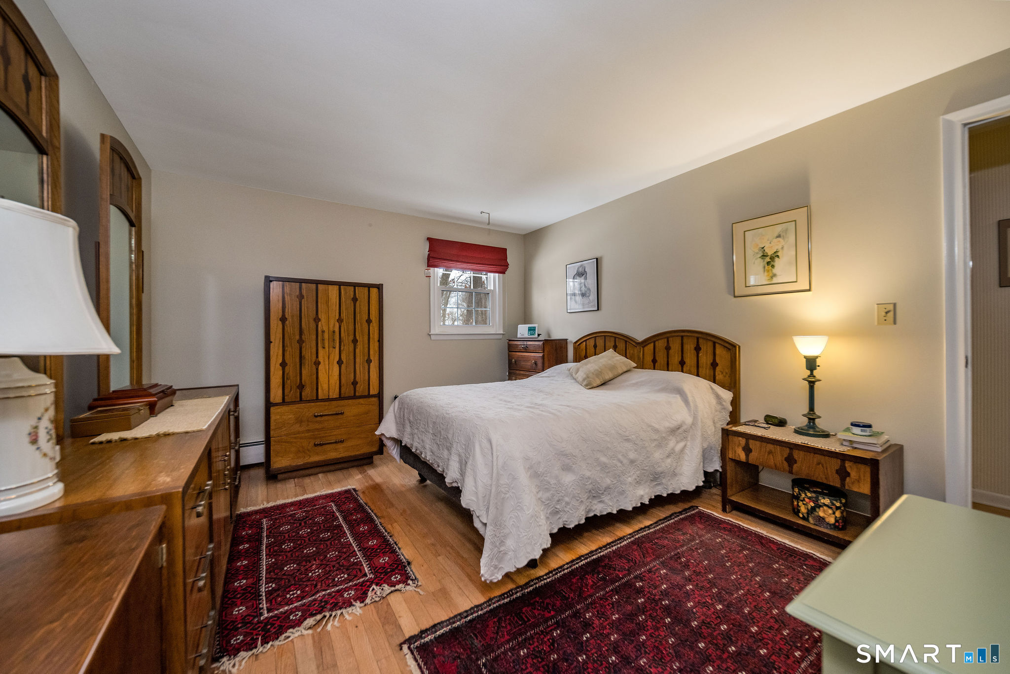 162 Yankee Peddler Path Madison, CT 06443 - Photo 15 of 39 a bedroom with bed and a window